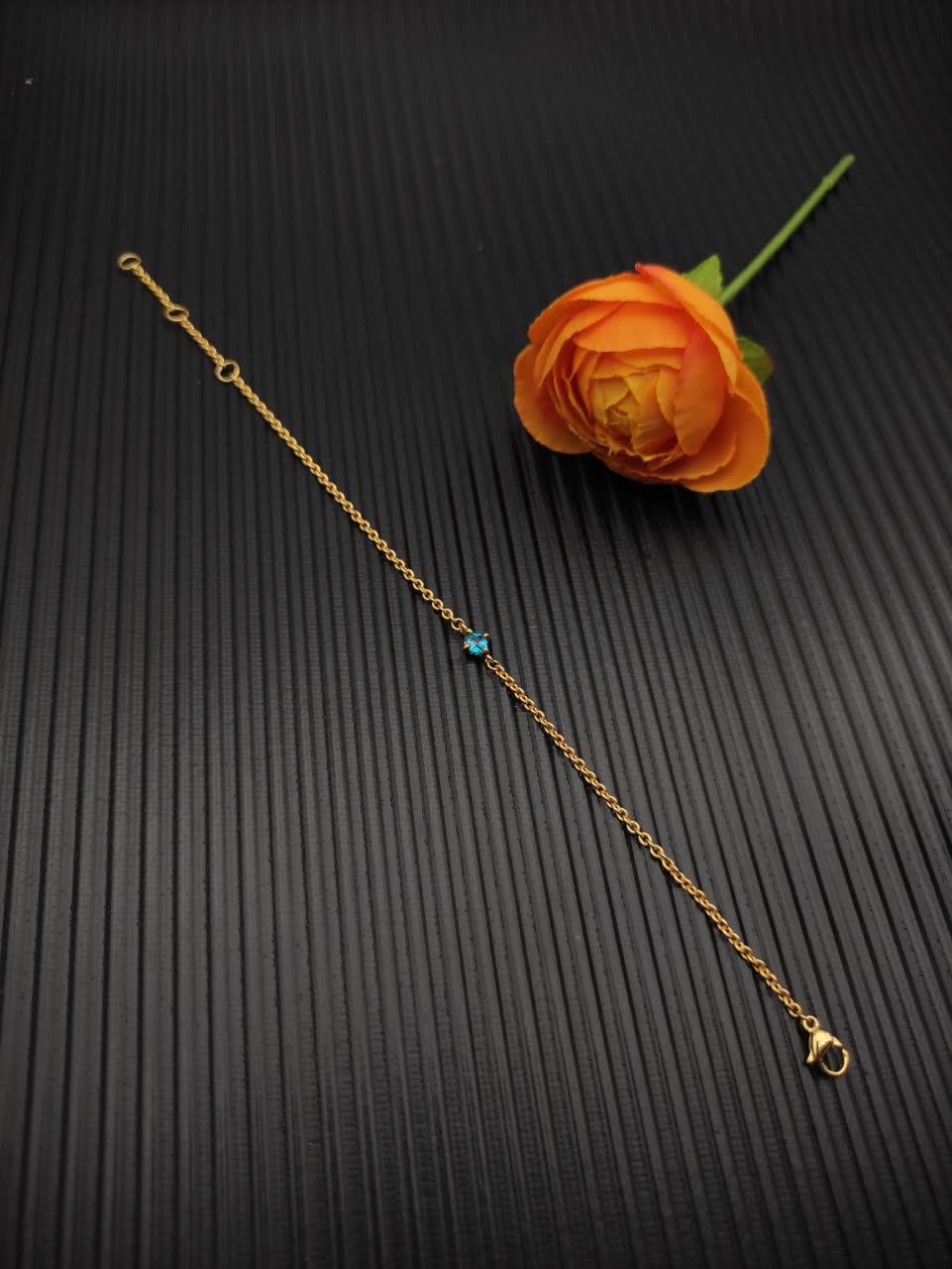 David Yurman Elegant Gold Bracelet with Blue Gemstone